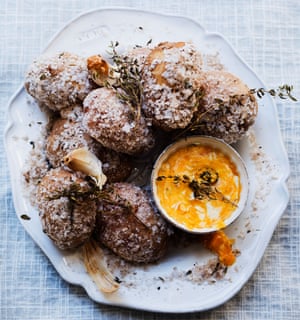 Nigel Slater’s salt-crust potatoes with blue cheese and goat’s curd.