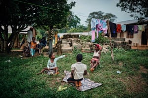 Children sitting on grass