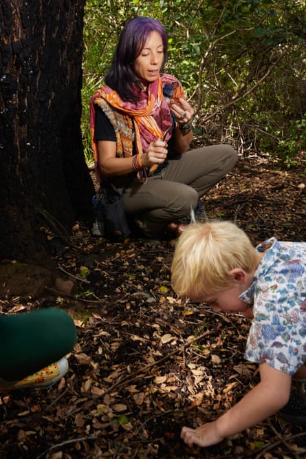 Jess Starwood holds up a southern candy cap mushroom found while foraging on a trail in Calabasas, California. Jess is a herbalist, forager and chef, and also teaches classes focusing on wild foods.