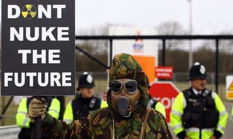 A protestor at the gates of the Hinkley Point nuclear site