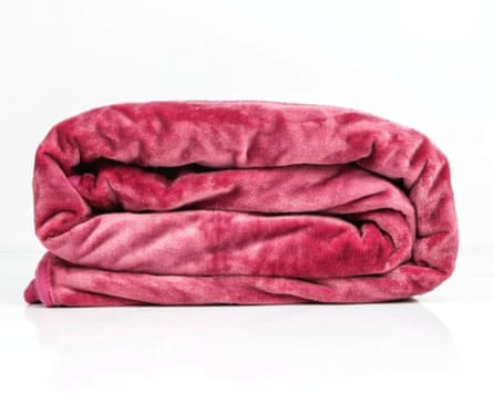 A folded dark pink waterproof Splash Blanket