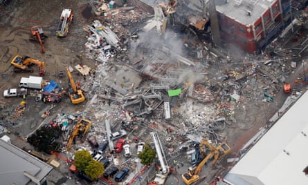 An aerial view of emergency services people working at the ruined CTV building in central in Christchurch, New Zealand in 2011.