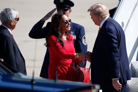 a man and a woman shake hands