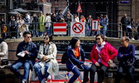 Tourists on amsterdam bridge