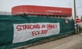 A banner reading “Standard on strike!” appears outside the club’s Stade Maurice Dufrasne home on Friday.