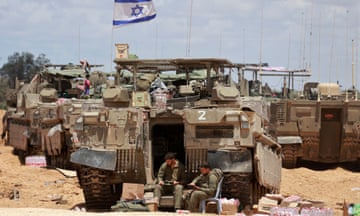 Israeli army tanks in position near the border with the Gaza Strip