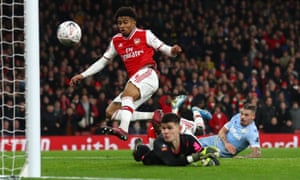 Reiss Nelson scores for Arsenal against Leeds in the FA Cup in January.
