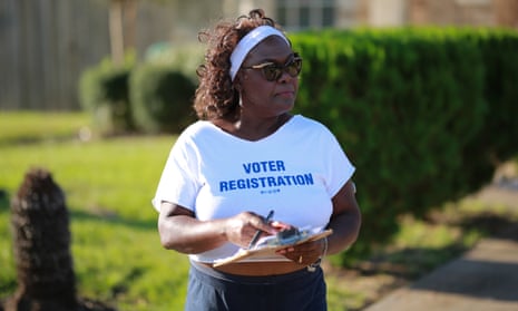 Cynthia Ginyard holds a clipboard full of voter registration cards on her canvassing trail. Ginyard has been the chair of the Fort Bend county Democratic party since 2016.