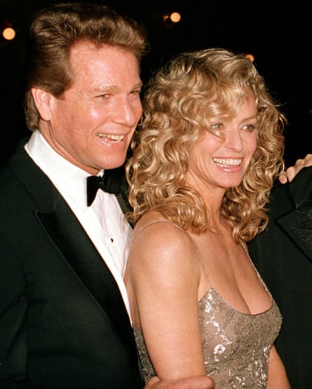 Ryan O'Neal and Farrah Fawcett at the premiere in New York of his film Chances Are, 1989.