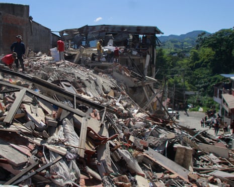Residents search through the rubble after the 7.4 magnitude earthquake.