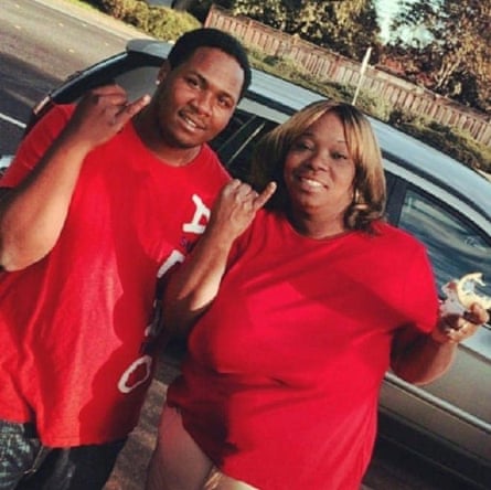 Dujuan Armstrong, left, with his mother, Barbara Doss.