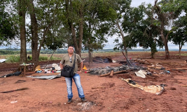 Mario Rivarola, a Mbyá Guaraní craftsman, surveys the wreckage after a police eviction of the indigenous Hugua Po’i community in eastern Paraguay.