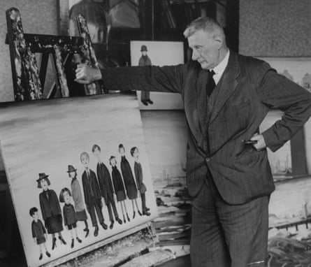 Lowry stands next to one of his paintings of some schoolchildren