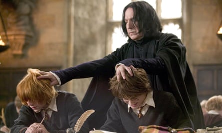 Rickman with Rupert Grint and Daniel Radcliffe in Harry Potter and the Goblet of Fire (2005).
