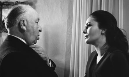 Karin Dor with Alfred Hitchcock during the filming of the 1969 film Topaz.