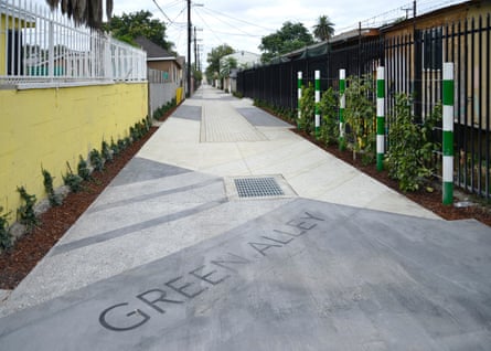 one of the redesigned alleyways in a south Los Angeles neighbourhood, with bioswales projected to capture 760,000 gallons of stormwater per year.