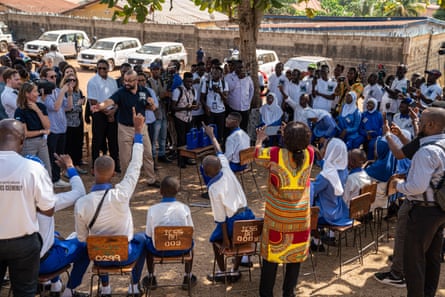 James Cleverly with pupils at the Islamic Call Secondary School in Bo.