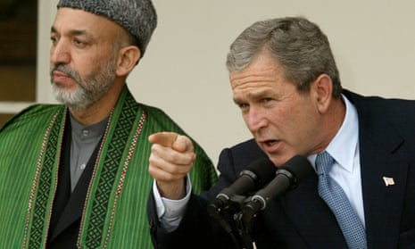 George W Bush with Hamid Karzai, then Afghanistan’s interim authority chairman, in January 2002