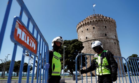Police close off a seaside promenade in Thessaloniki, Greece