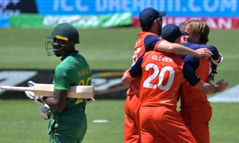 Netherlands players celebrate a famous 13-run victory over South Africa in Adelaide.