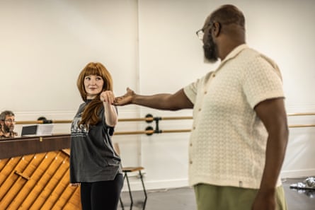 Roberts rehearsing with her Hadestown co-star Chris Jarman