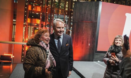 Pekka Haavisto poses for a photo with supporters in Helsinki.