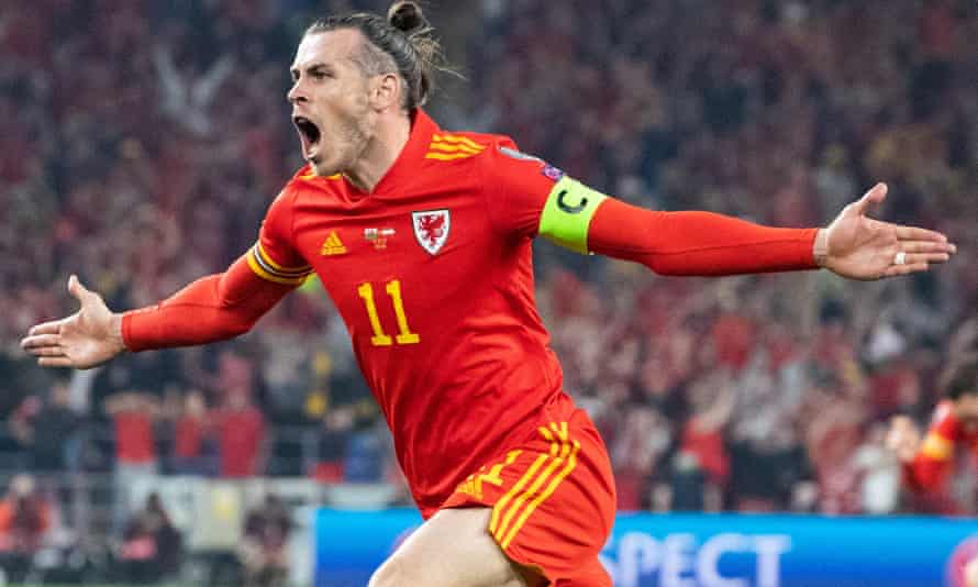 Gareth Bale celebrating after doing Superhero stuff against Austria.