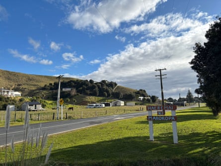 A quiet street running through the town of Marokopa in New Zealand