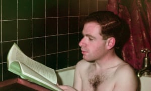 Theatre producer Peter Brook reading a script in the bath (1949)
