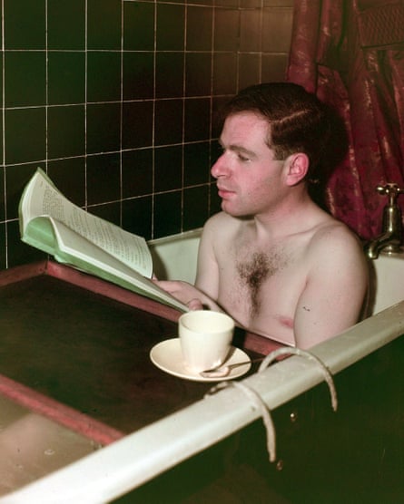 Brook reading a script in the bath in 1949.