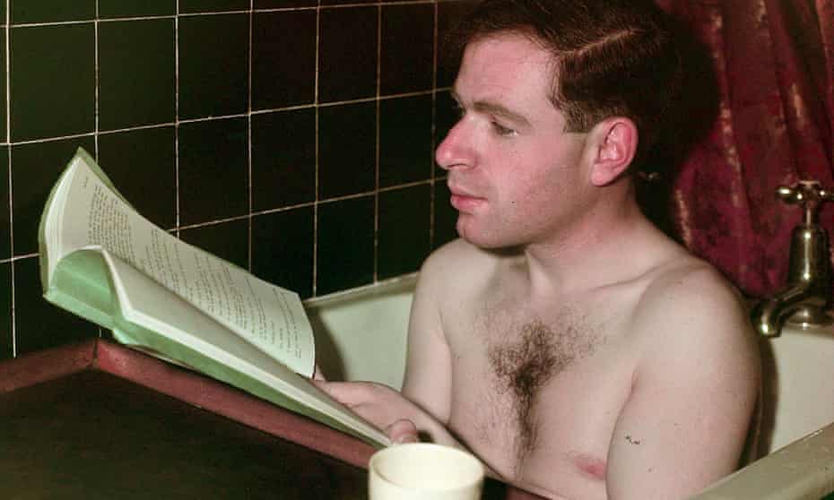 Peter Brook reads a play in the bath in 1949.