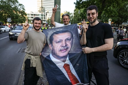 Supporters of Recep Tayyip Erdoğan celebrate his election victory on Berlin’s Kurfürstendamm avenue, 28 May 2023.