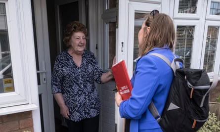 Pauline Harris on her doorstep with Jen Craft
