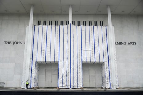 A tarp covers the facade of the John F. Kennedy Memorial Center for the Performing Arts on 28 June.