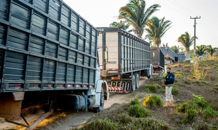 Truck convoy and an armed government agent