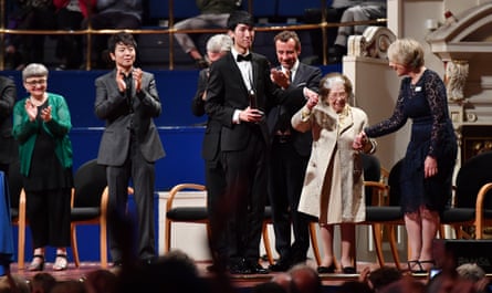A group of people standing on a stage
