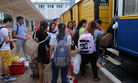 Passengers board in Phnom Penh.