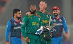 Andile Phehlukwayo and Rassi van der Dussen celebrate after guiding South Africa home against Afghanistan