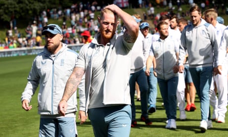 England coach Brendon McCullum (left) and captain Ben Stokes leave the field at the end of day five