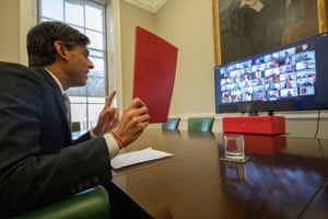 Rishi Sunak talking to people who have had government support during the Covid crisis, ahead of today’s budget. He’s holding a copy of the budget red book.