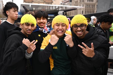 Socceroos supporters arrive to watch the game at a live site at Federation Square, in Melbourne.