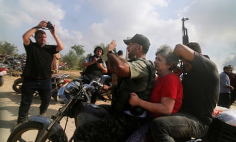 Adina Moshe was pictured being driven into the Gaza Strip by Hamas militants on 7 October.