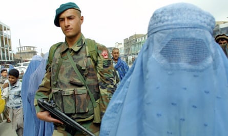 A Turkish soldier on patrol in Kabul, April 2002.