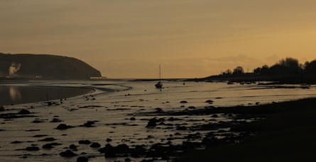 Estuary at low tide at sunset