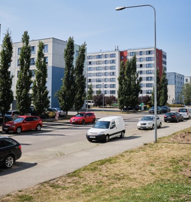 High-rise flats and a few cars