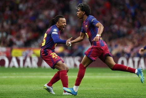 Barcelona’s Lamine Yamal celebrates scoring their first goal with Jules Kounde.