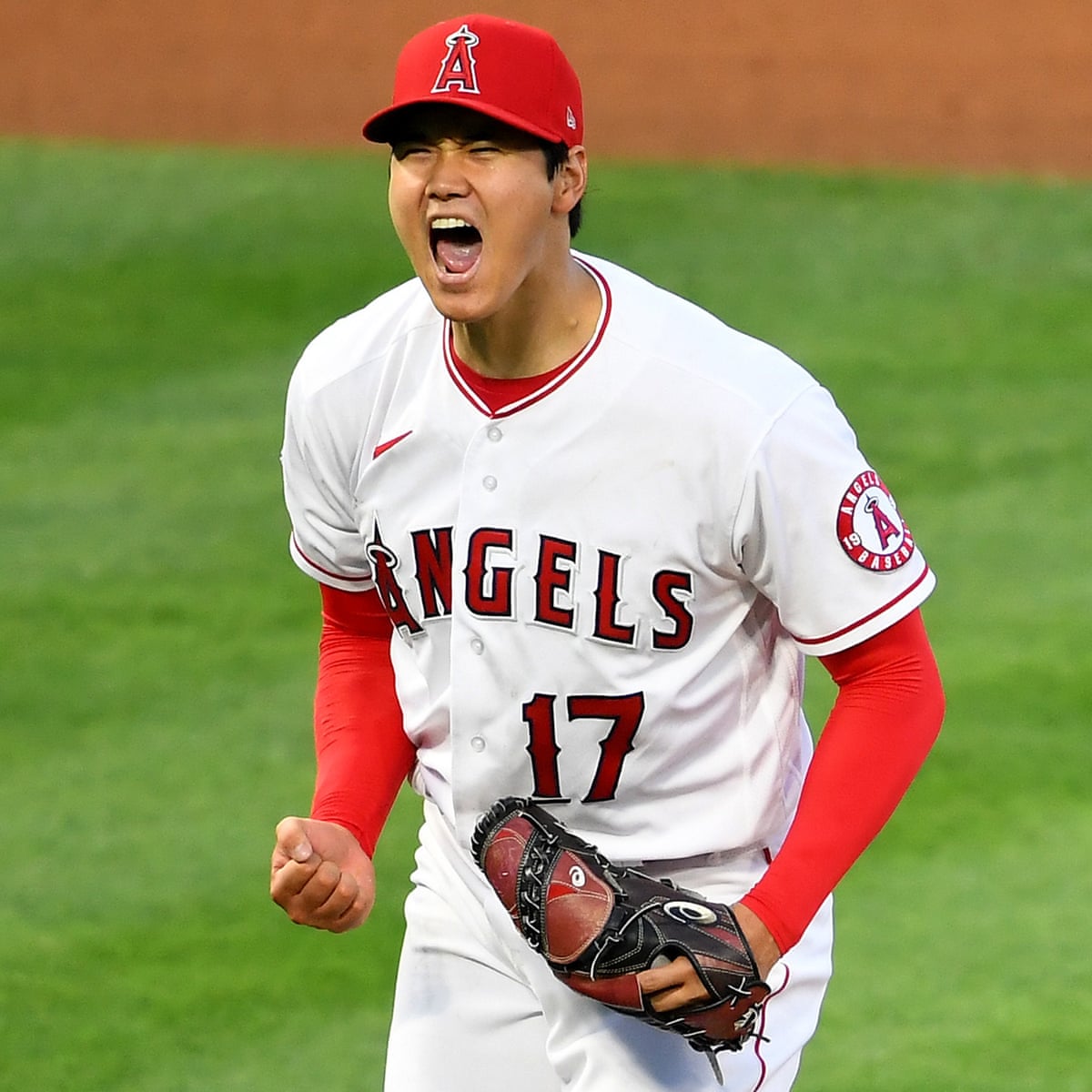 Dual Threat Star Ohtani Pitches 100mph Then Hits 450ft Hr In Same Inning Mlb The Guardian Dual Threat Star Ohtani Pitches 100mph Then Hits 450ft Hr In Same Inning Mlb The Guardian