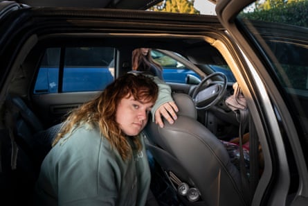 Sierra sits in their car parked outside their apartment in County, California. Sierra and Priscilla lived in their car for a short period of time before they were able to find help from Family Promise and live in their emergency shelter.