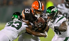 Cleveland Browns tight end Zaire Mitchell-Paden (83) is tackled by New York Jets linebacker Claudin Cherelus (41) and Jimmy Moreland during the second half of Thursday’s game.