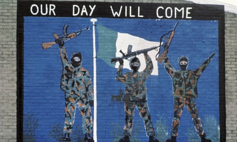 Wall mural with three soldiers painted holding guns up in the air below a sign that says OUR DAY WILL COME